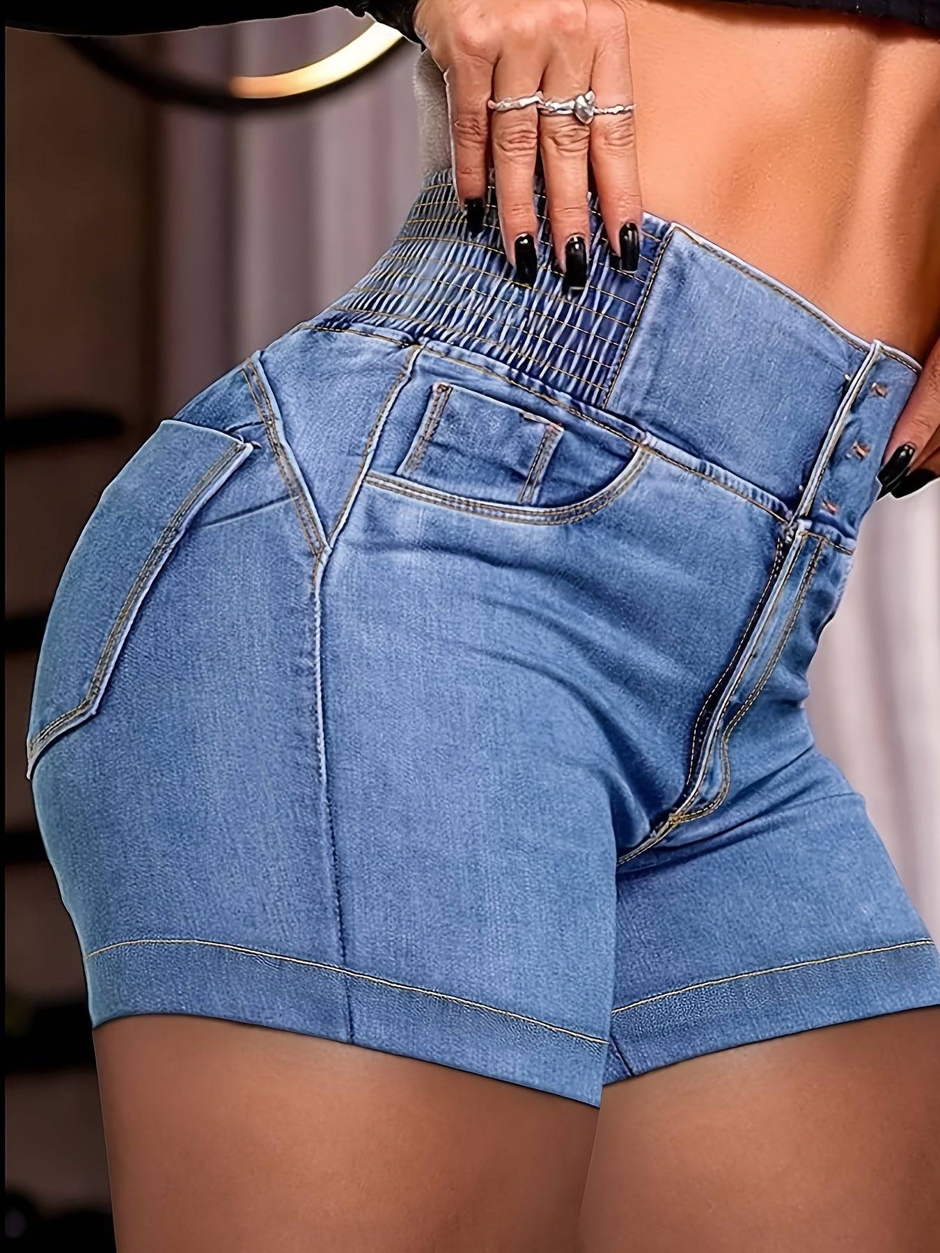 High-waisted women’s denim shorts with stretch slim fit and frayed hem, featuring multicolor crisscross design and knee-length cut.