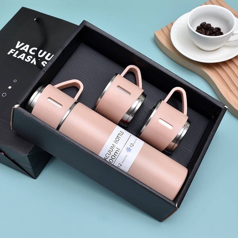 Pink insulated stainless steel bottle set with 500ml flask and 3 cups in a gift box, perfect for stylish beverage storage at school or office.