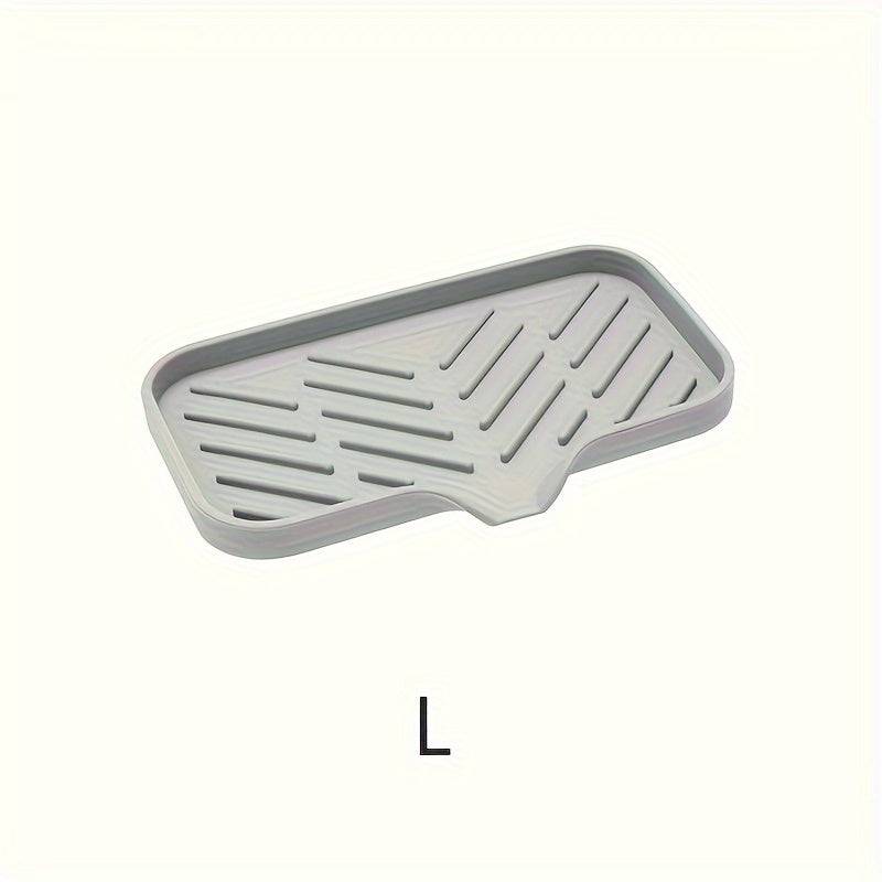 Large size silicone sink tray with angled drainage grooves and raised edges, ideal for holding multiple cleaning items.