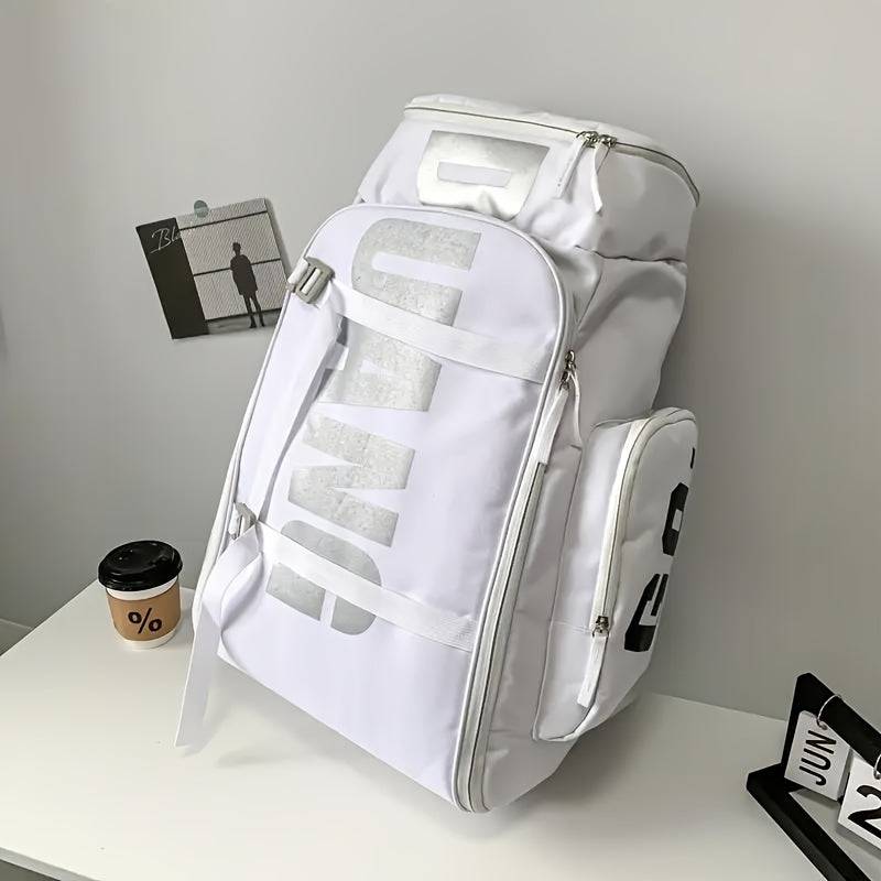 White large travel backpack with silver DUANI print, displayed on a desk to highlight its sleek design and functional compartments.