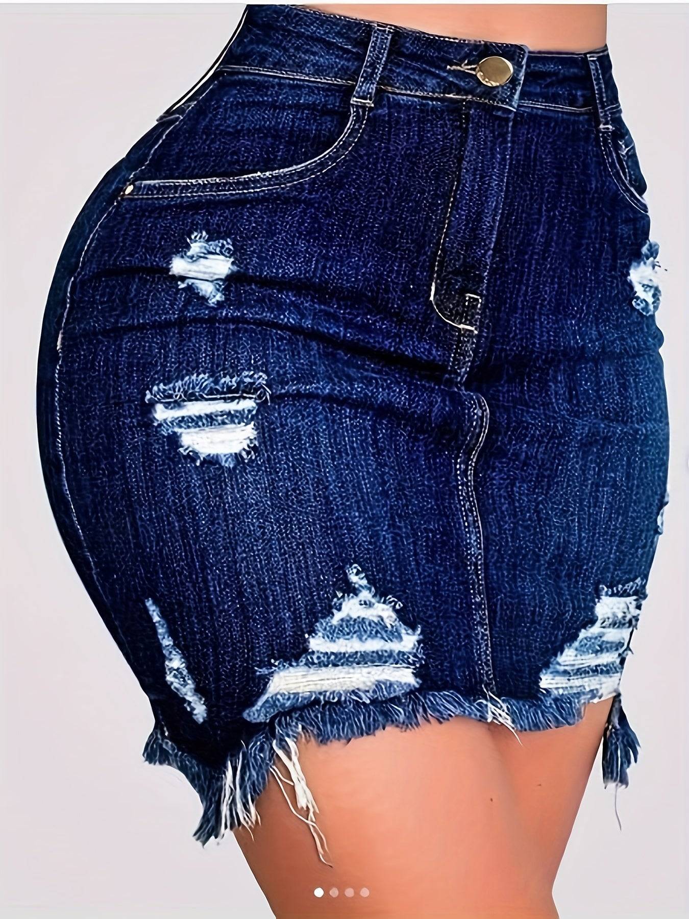 High-waisted distressed denim skirt with blue washed look, frayed hem, and ripped details for 3-season casual wear in women's clothing.