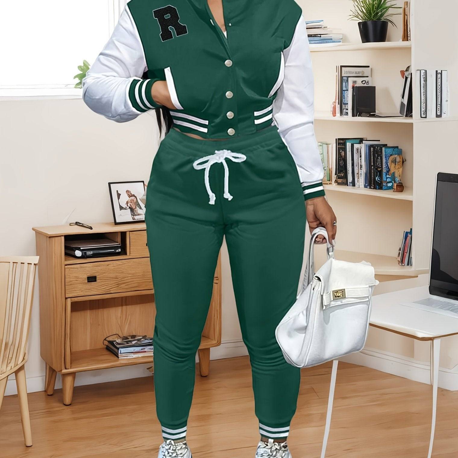 Dark green women’s 2-piece sportswear set with varsity jacket and drawstring pants, ideal for casual athletic wear or lounging.