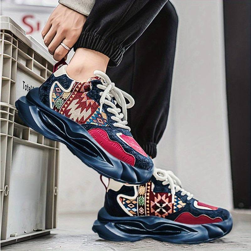 Navy and red Women’s Plus Size Chunky Sneakers worn with joggers, showcasing thick sole and vibrant tribal pattern for sporty fashion.