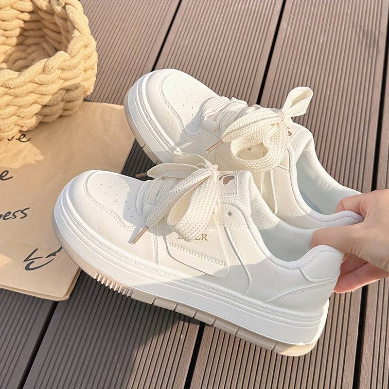 Women’s pink & white casual sneakers with non-slip sole and round toe, ideal for everyday wear and styled with thick white laces.