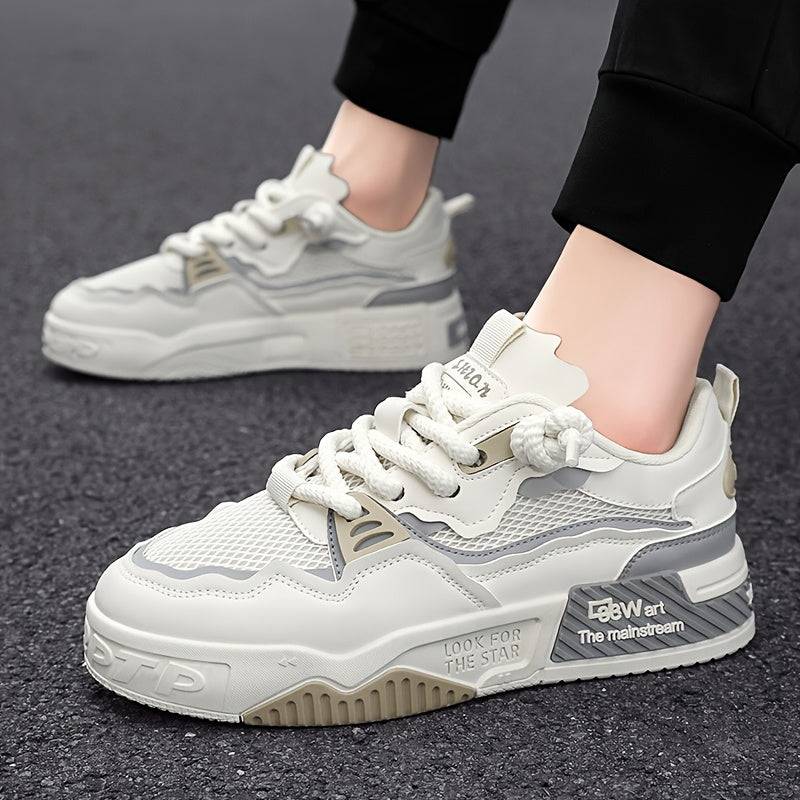 Beige men’s low-cut sneakers with gray accents, breathable mesh, and cushioned sole designed for comfort during outdoor and casual use.