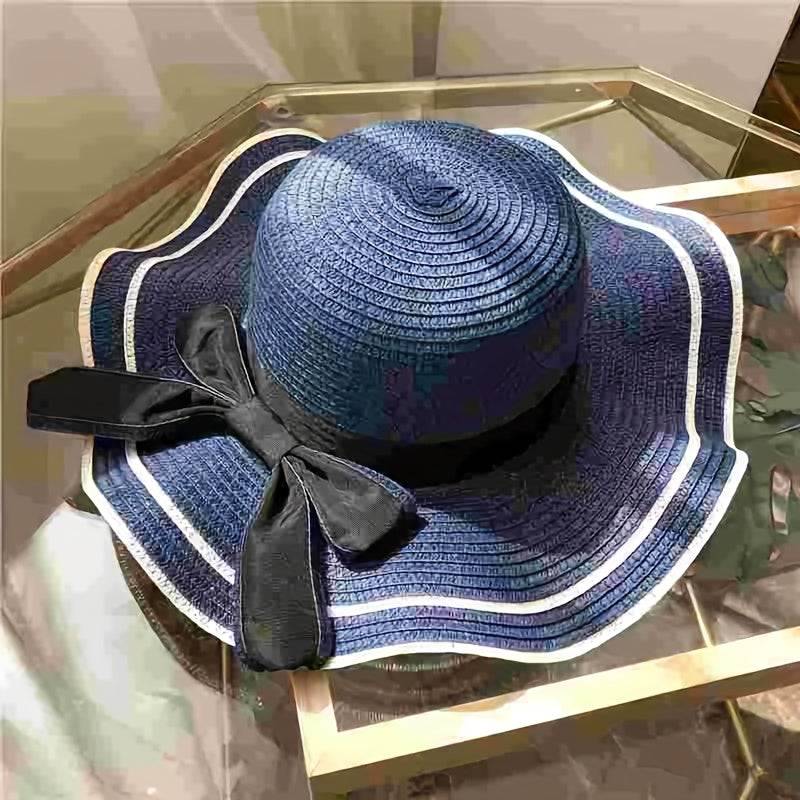 Women's summer beach sun hat with UV protection, wide brim straw-style hat with bow and flower, lightweight for travel