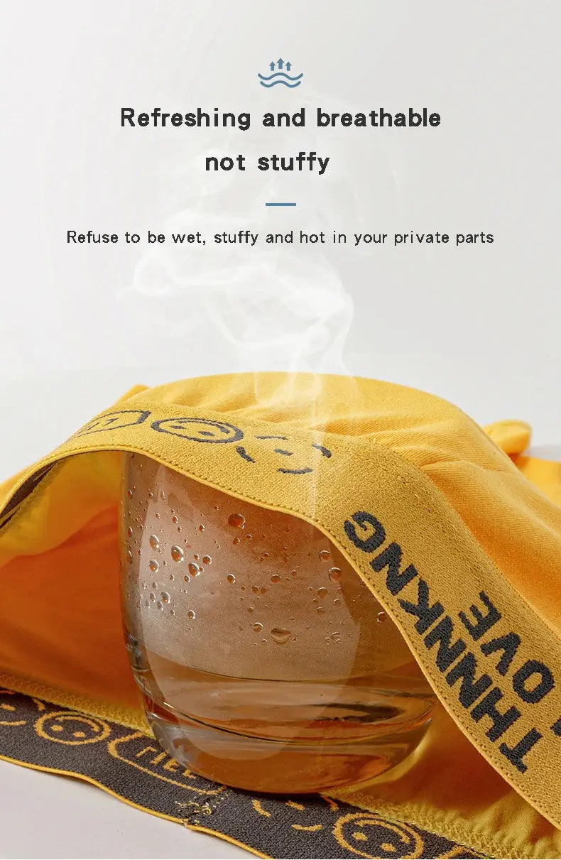 Steam test on yellow men's boxer briefs showing breathable fabric with HELLO waistband, ensuring dryness and ventilation.