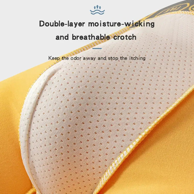 Double-layer moisture-wicking crotch in yellow men's cotton boxer briefs, designed for odor control and itch prevention.