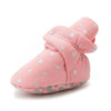 Pink newborn shoe with silver star pattern