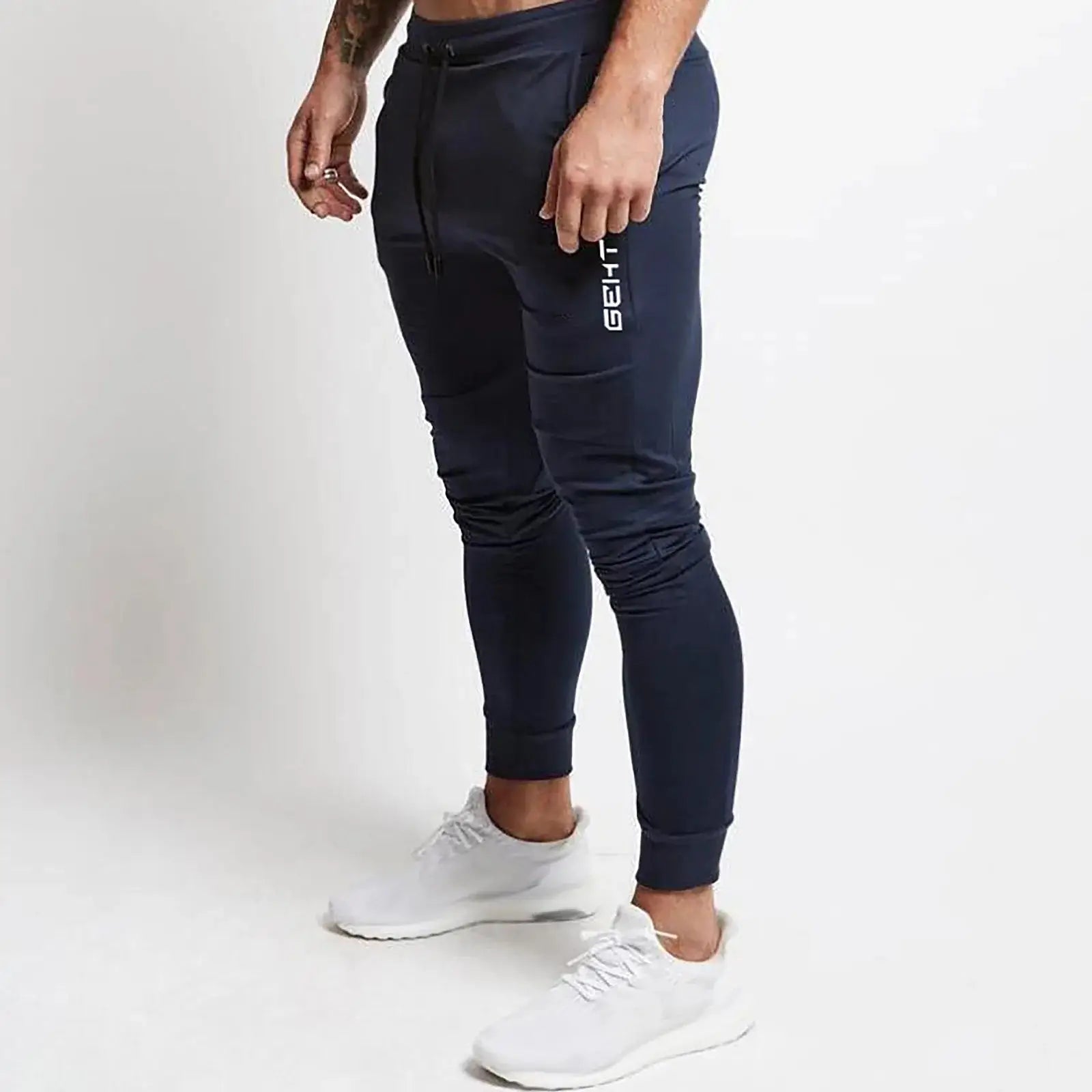 Navy blue men’s athletic jogger sweatpants with pockets and tapered legs, plus size fit for gym, workout, or everyday activewear.