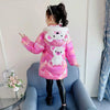 Back view of girl in pink down jacket with bear design