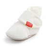 Plain white newborn shoe with soft sole