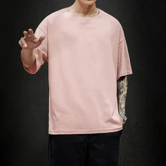 Men's casual pink T-shirt perfect for summer daily wear.