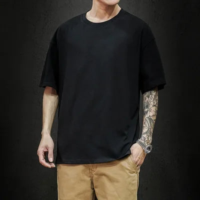 Men's casual black T-shirt with a minimalist and sleek design.