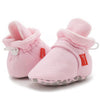 Pink newborn shoes with drawstring closure