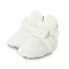 Plain white newborn shoes with soft texture