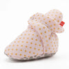 Pink newborn shoe with gold polka dots