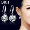 Noble zircon crystal drop earrings on model