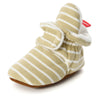 Beige striped newborn shoe with soft sole