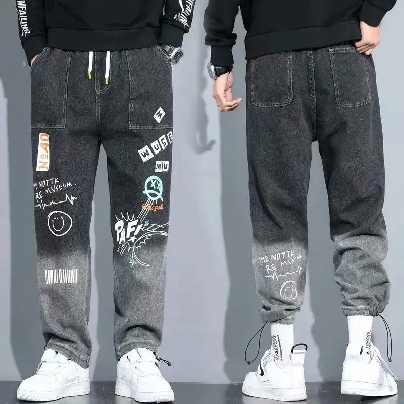 Dark gray graffiti-style cargo pants for men, front and back view.