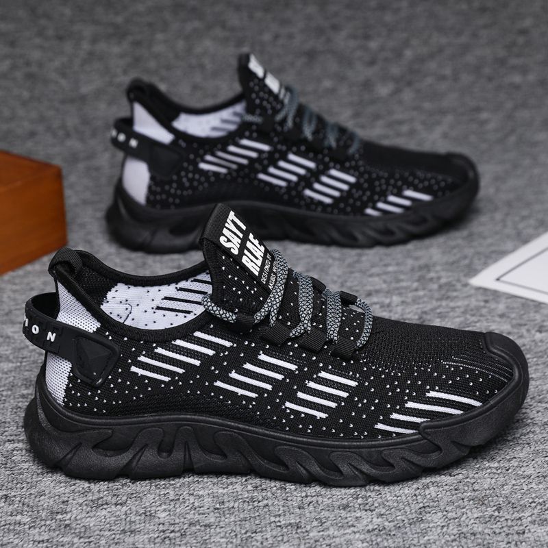 Black version of men's lightweight running sneakers with breathable mesh and soft sole, designed for flexibility and all-day comfort.