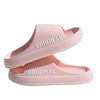 Pink original slide sandals stacked