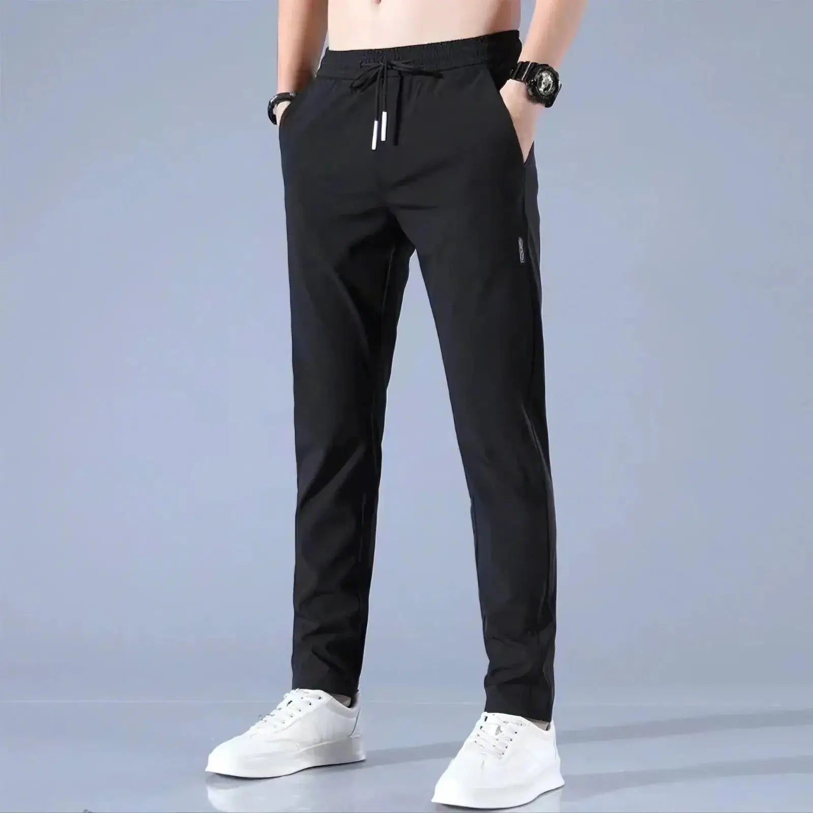 Front view of black men’s quick-dry stretch pants with breathable ice silk fabric, mid-waist loose fit and straight-leg cut for casual comfort.