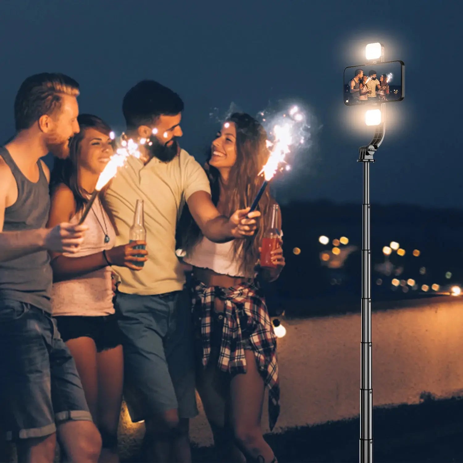 Group of friends using the Selfie Stick Tripod with Fill Light at night, showcasing bright LED illumination for low-light photography.