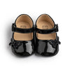 Black patent baby shoes with butterfly design