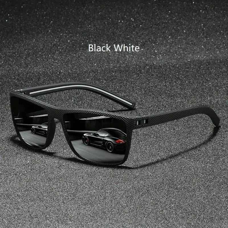 Black-white frame vintage square polarized sunglasses with UV400 lenses, reflecting a sleek car, designed for stylish driving and outdoor use.