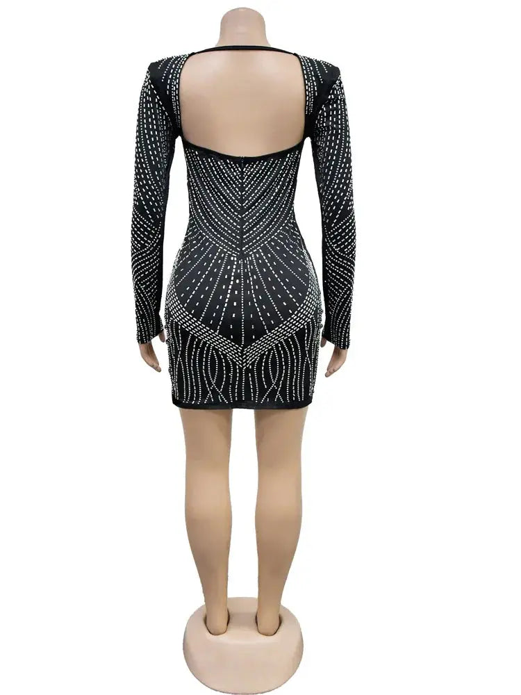 Back view of Beyprern black rhinestone mini dress with open back and geometric sparkle pattern, stylish choice for night out attire.