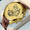 Gold luxury watch with brown leather strap