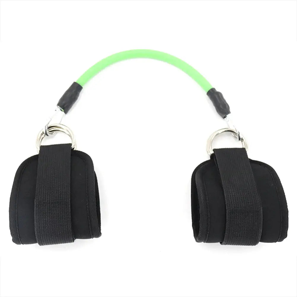 Close-up of green resistance band with two black ankle straps, designed for leg workouts and strength training routines.