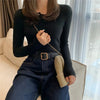 Black knitted women sweater with button decoration.