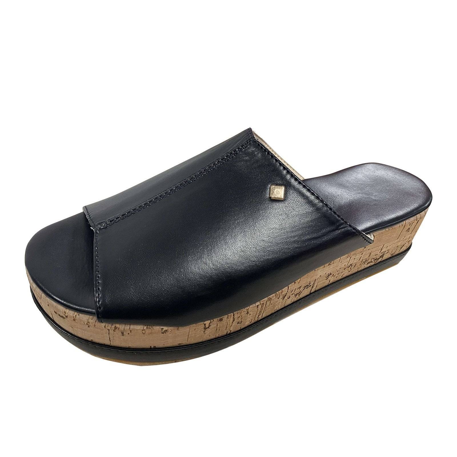 Black Roman-style wedge sandal with cork platform, ideal for women seeking stylish and casual summer shoes.