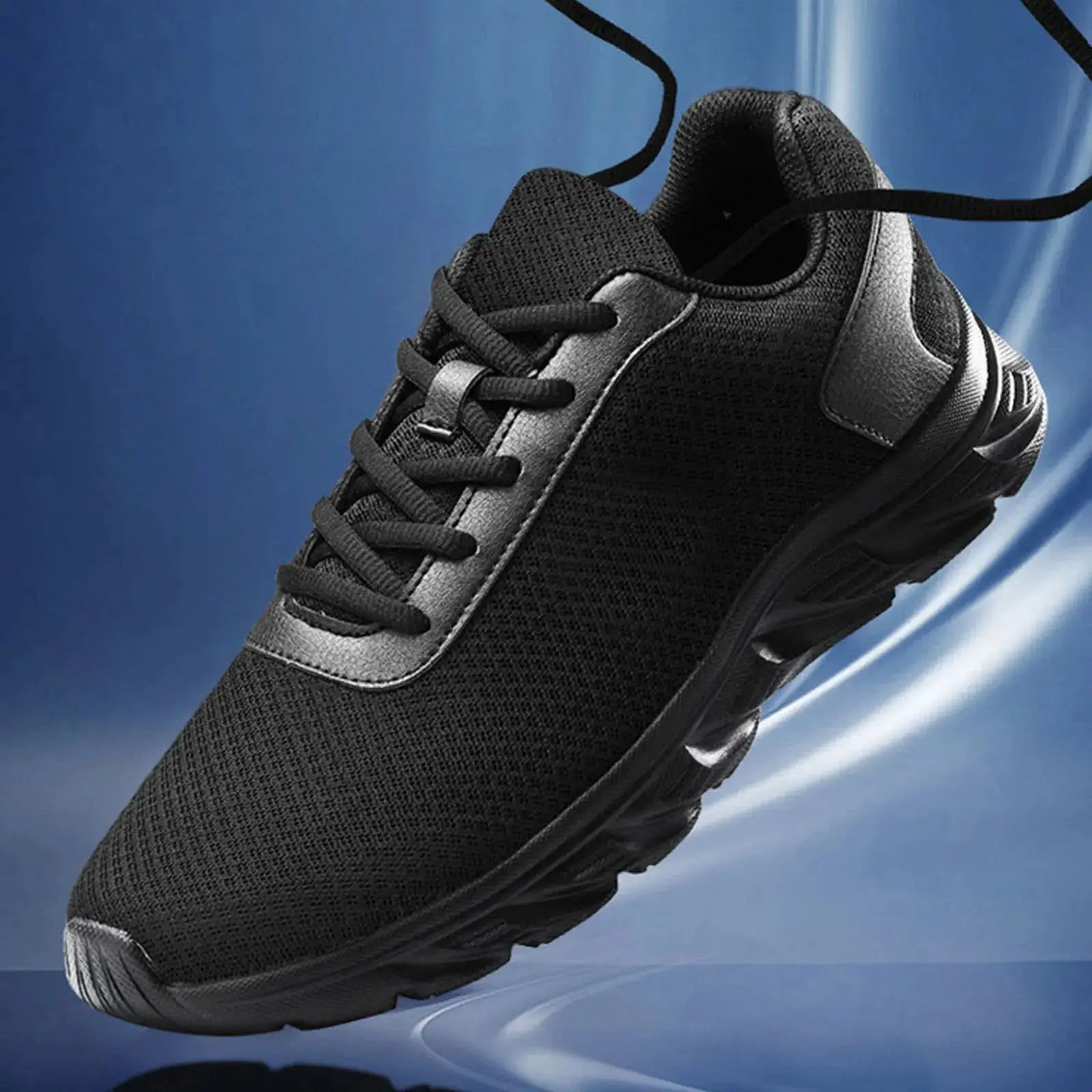 Floating black men's leather sneaker with mesh upper and curved sole, showcasing lightweight summer sports design.