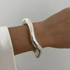 Silver vintage wide bracelet on wrist