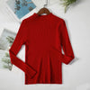 Red women's turtleneck sweater on hanger