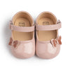 Pink patent baby shoes with butterfly design