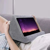 Gray tablet stand on a person's lap