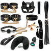 Leather bondage set with black and gold accessories