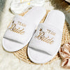 White bridal slippers with 'Team Bride' embroidery