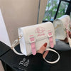 White Melody square bag with pink buckles