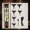 Black electric shaver with gold dragon design and accessories