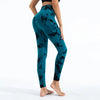 Teal and black patterned women's sports leggings