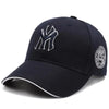 Dark blue baseball cap with white embroidered letters