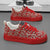 Men's sneakers with red swirl pattern on beige