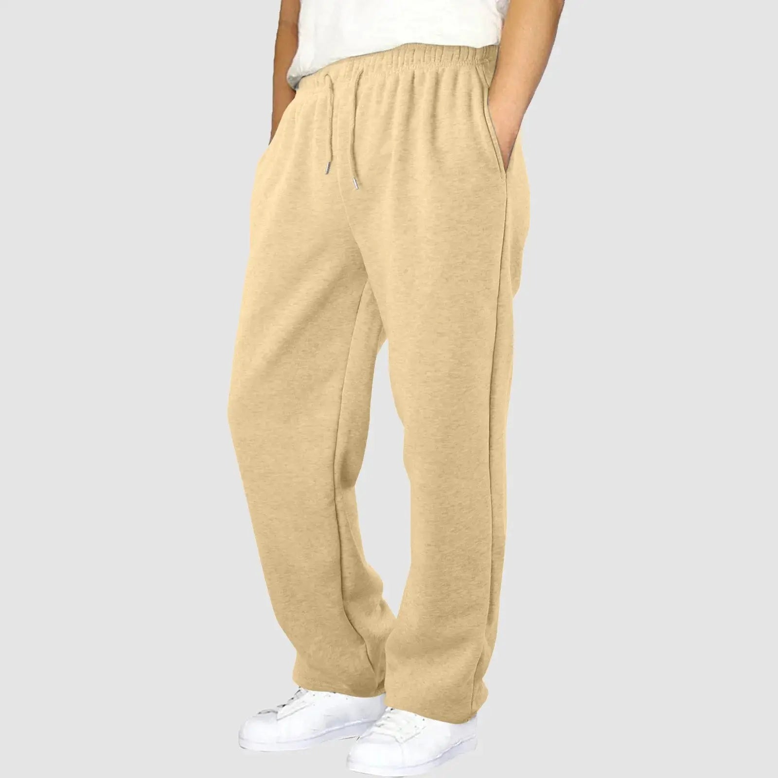 Beige men’s workout jogger pants with elastic waist, designed for comfort during workouts, training, or lounging.