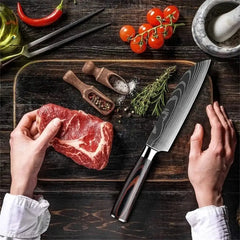 Chef's knife with steak and herbs on cutting board