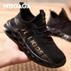 Black breathable children's shoe with gold accents